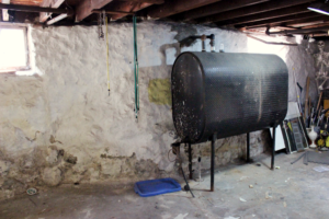 basement with old oil tank